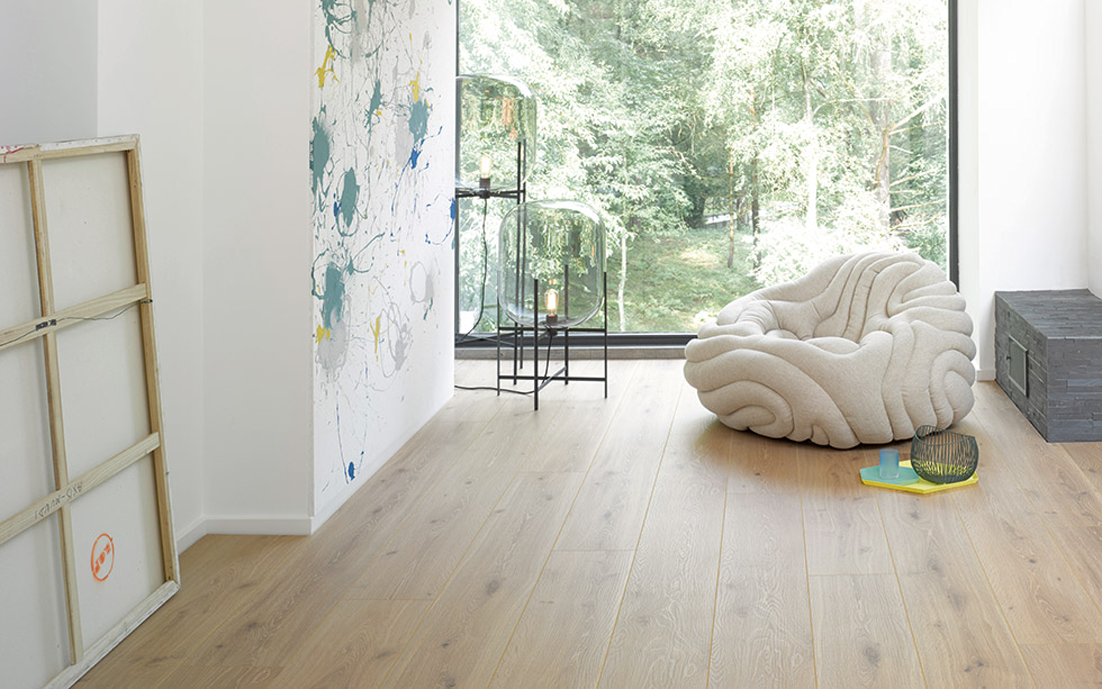 Light wood flooring in a sunlit interior